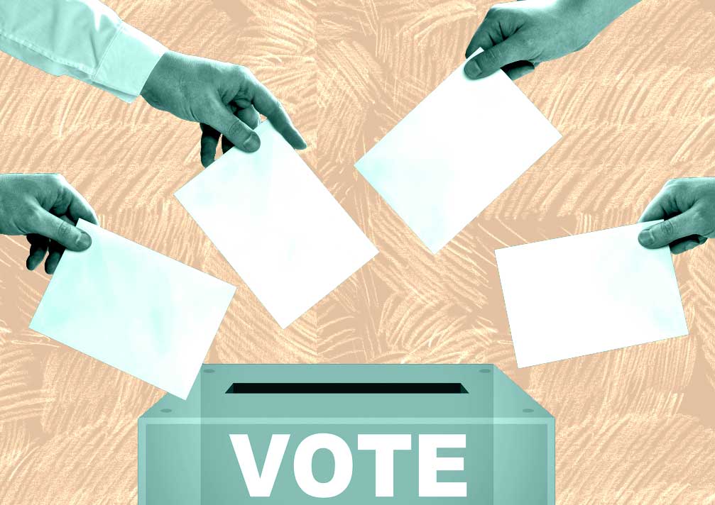 ballots hands putting ballots in a ballot box