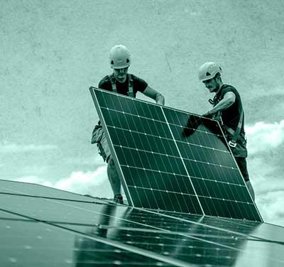 men installing solar panels
